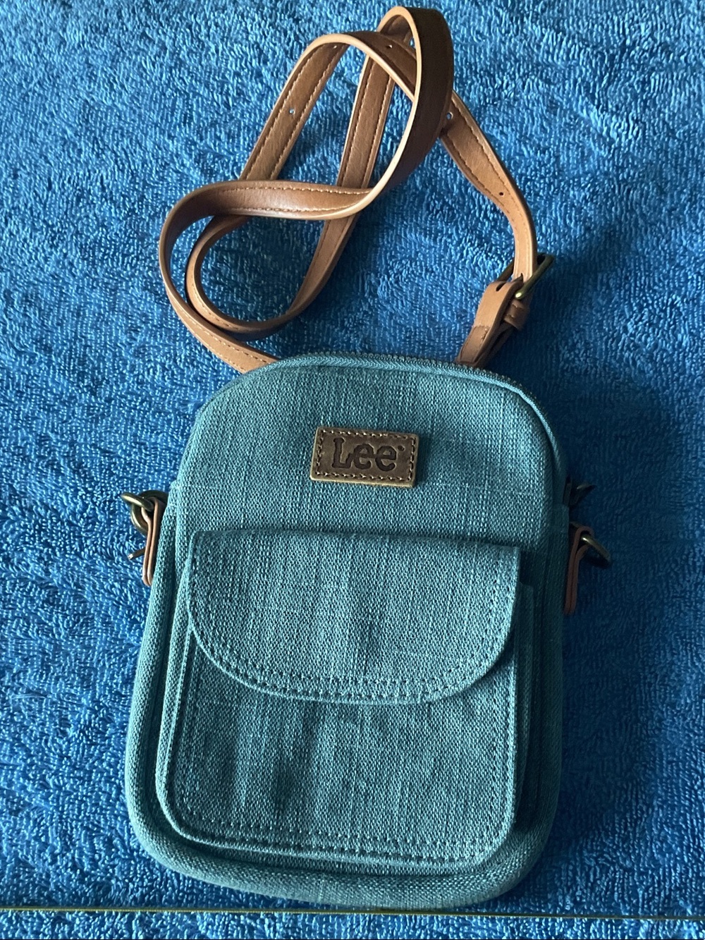 Lee Teal Crossbody with Brown Strap and Front Pocket